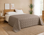 Beige Tencel Weighted Blanket styled on a bed